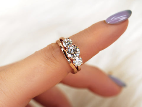 three stone ring wedding set on pointer finger