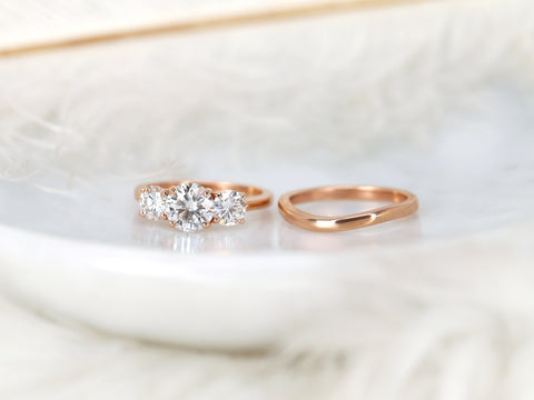 three stone ring wedding set on white background