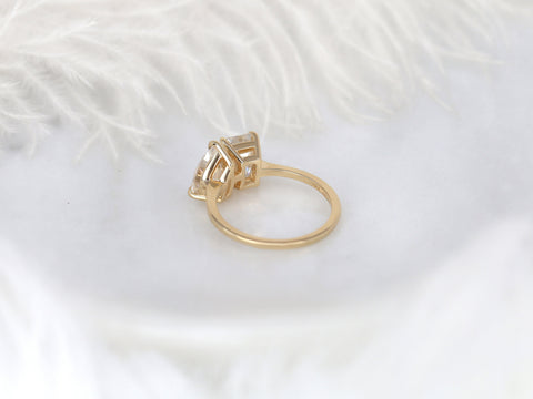 Two-tone 14kt gold ring with twin rectangular stones set side by side on a soft white surface