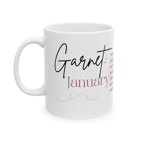White ceramic mug with "Garnet" and "January" in stylish script alongside a decorative swirl detail