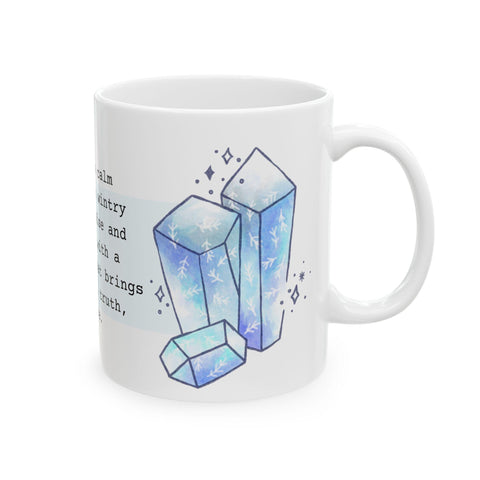 White ceramic mug decorated with blue crystal illustrations and delicate snowflake patterns