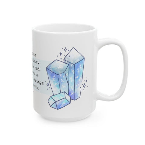 White ceramic mug with blue crystal illustrations and snowflake patterns on the side