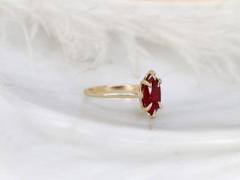 14kt gold ring with marquise cut deep red ruby solitaire on a slim polished band fine jewelry