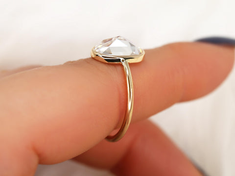 oval rose cut ring on pointer finger sideview in yellow gold