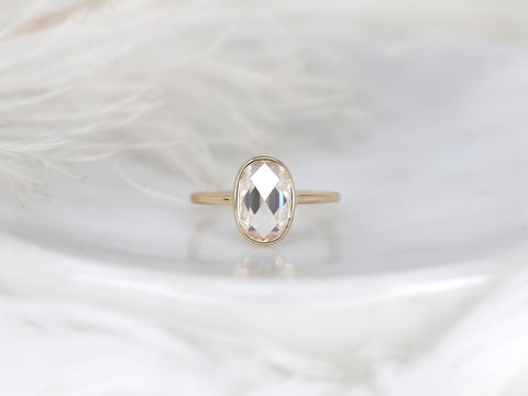 oval rose cut ring on white background