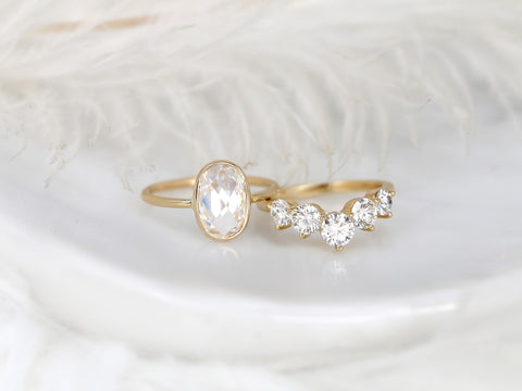 rose cut moissanite oval bezel ring with 5 stone wedding ring on white background