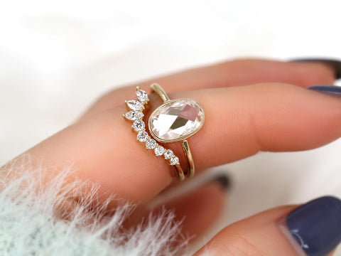 moissanite rose cut ring in oval cut paired with unique curved diamond band on pointer finger