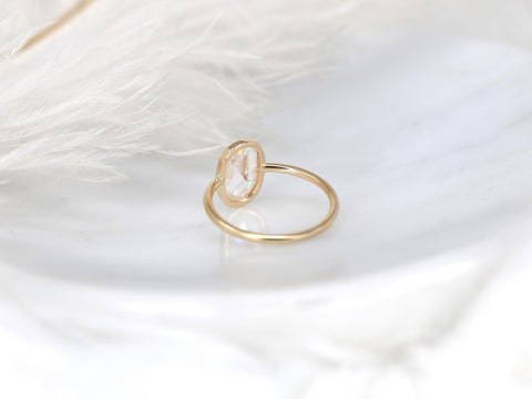oval rose cut ring on white background from back