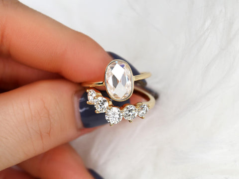 rose cut moissanite oval bezel ring with 5 stone wedding ring on hand