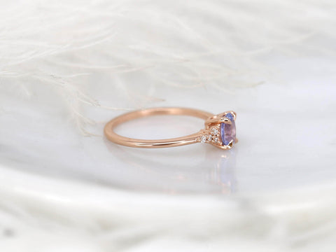 oval cluster sapphire ring with lavender sapphire in rose gold with white background sideview view