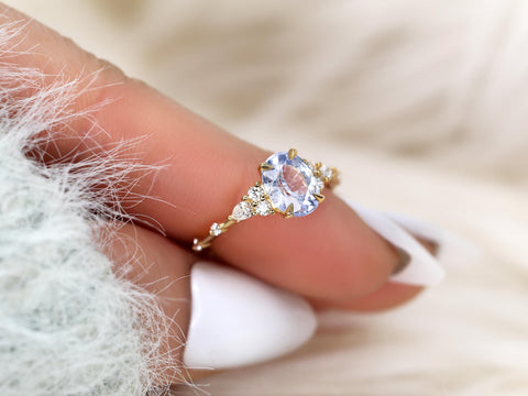 frosted lavender cornflower sapphire oval cluster ring in 14kt gold on side finger