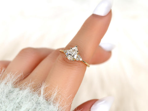 pear cut cluster diamond ring on a pointer finger