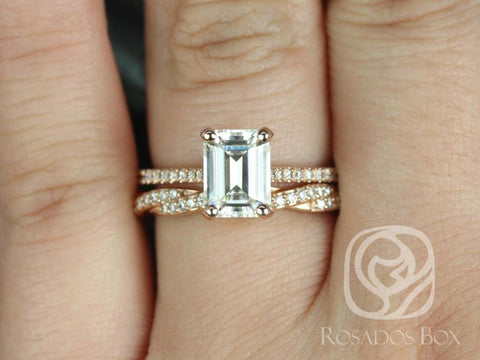 Emerald cut moissanite vintage twist bridal set in 14kt gold worn on a finger