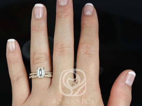 Emerald cut moissanite vintage twist bridal set worn on a finger