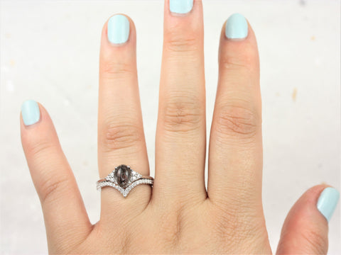 14kt gold bridal set with oval tourmalinated quartz center and delicate diamond accents on finger