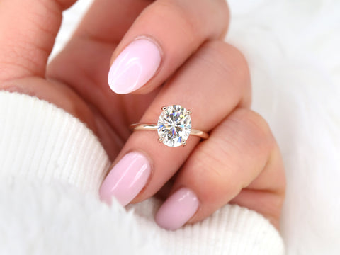 3ct Dakota 10x8mm 14kt Rose Gold Moissanite 4 Prong Oval Engagement Ring