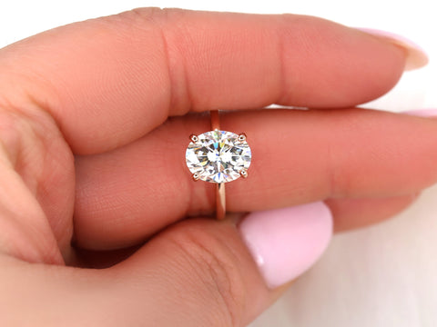 3ct Dakota 10x8mm 14kt Rose Gold Moissanite 4 Prong Oval Engagement Ring