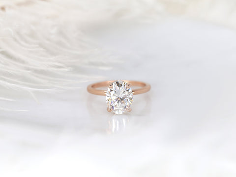 3ct Dakota 10x8mm 14kt Rose Gold Moissanite 4 Prong Oval Engagement Ring