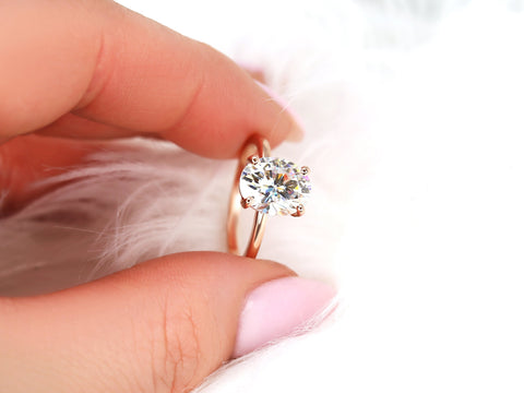 3ct Dakota 10x8mm 14kt Rose Gold Moissanite 4 Prong Oval Engagement Ring