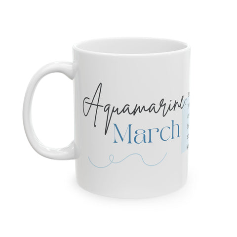 White ceramic mug with elegant script highlighting Aquamarine as March birthstone on a clean background