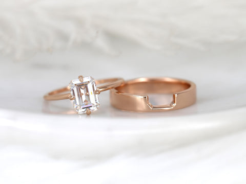 14kt rose gold bridal set featuring an emerald cut moissanite solitaire and matching contour wedding band