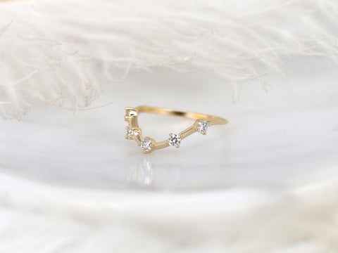 Delicate 14kt gold ring with a unique angular design featuring small sparkling diamonds on a smooth band