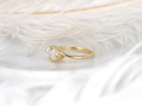 Delicate 14kt gold ring with a horizontally set marquise diamond solitaire, ideal for fine jewelry or engagement gift.