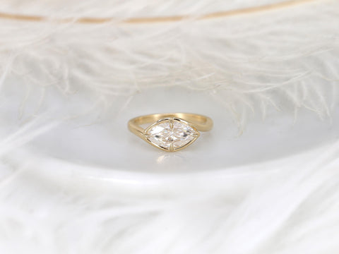 Delicate 14kt gold ring with a horizontally set marquise diamond, elegant fine jewelry for engagement or special occasions