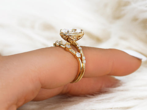antique cushion engagement ring with button back paired with a curved diamond spaced band on pointer showing gallery view