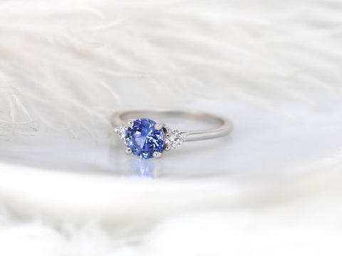 cornflower blue sapphire three stone ring white background angled view