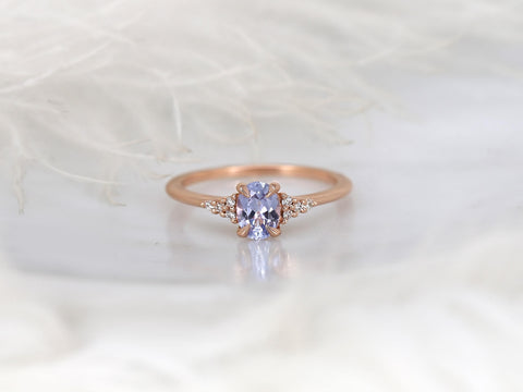 oval cluster sapphire ring with lavender sapphire in rose gold with white background front view