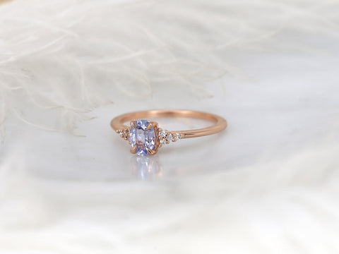 oval cluster sapphire ring with lavender sapphire in rose gold with white background angle left view