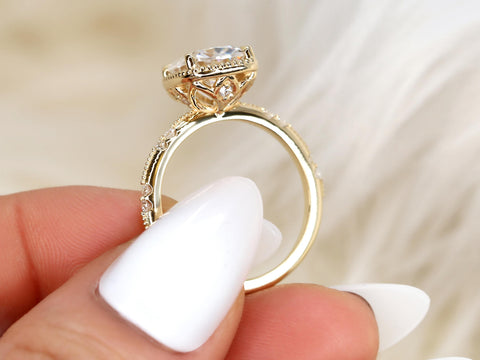antique cut cushion button back solitaire with diamond accents gallery profile pinched between fingers