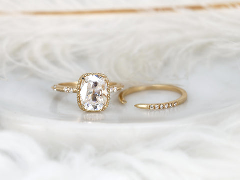 antique cushion button back ring with milgrain edge paired with a open diamond band with pointed opening on white background different angle