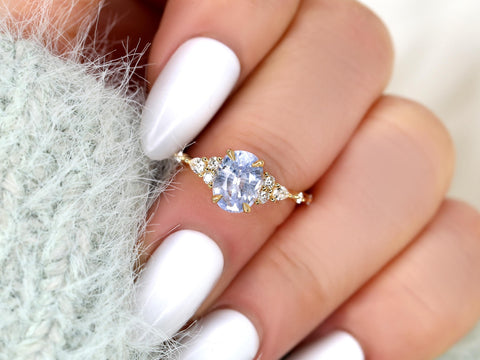 frosted lavender cornflower sapphire oval cluster ring in 14kt gold on middle finger