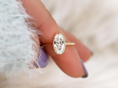 moval diamond button back ring with milgrain in halo and plain shank and lucida gallery on finger