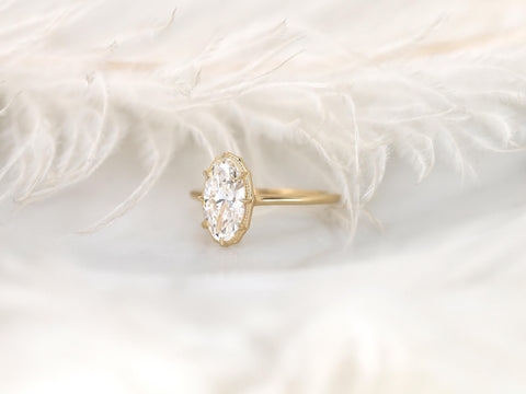 moval diamond button back solitaire ring with milgrain in halo and plain band side view