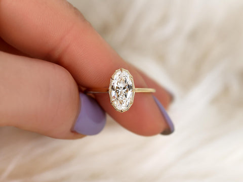 moval diamond button back ring with milgrain in halo and plain shank and lucida gallery on pointer and thumb