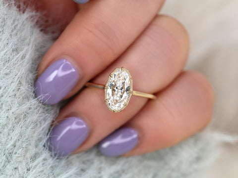 moval diamond button back ring with milgrain in halo and plain shank and lucida gallery ring finger