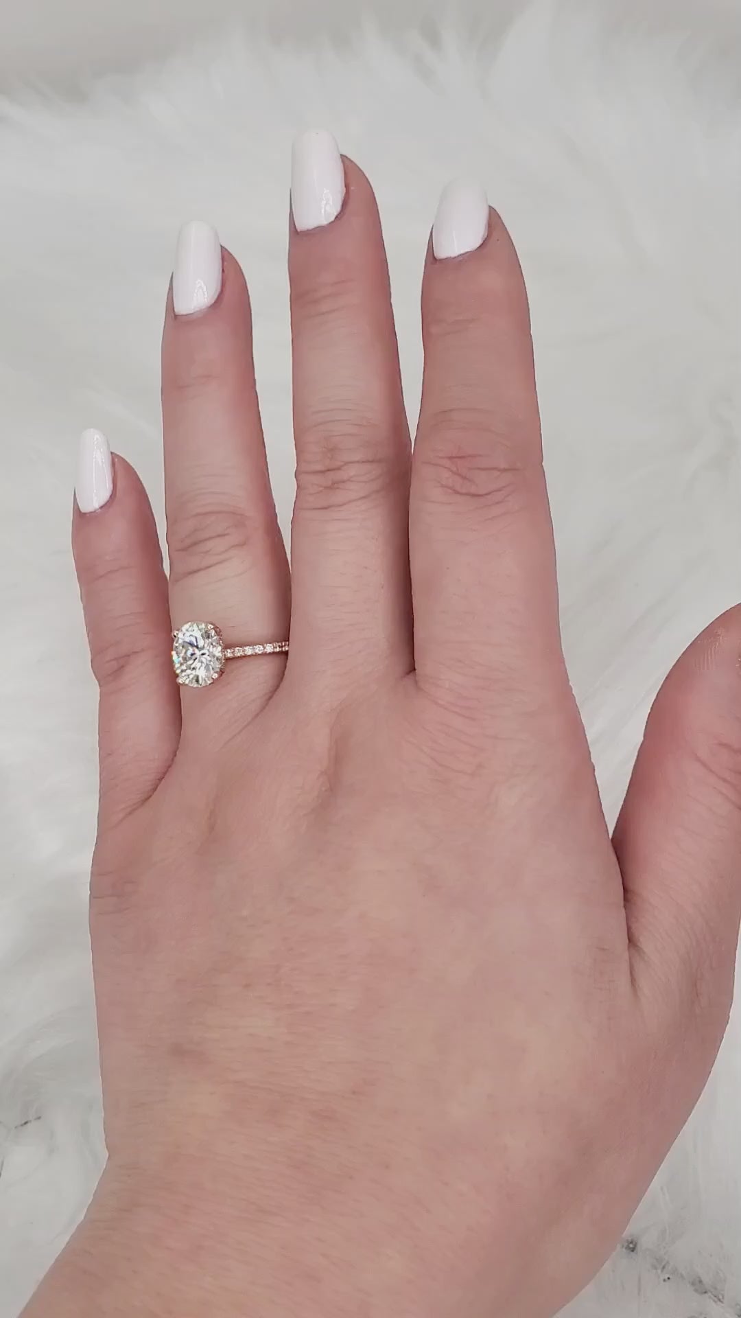 oval solitaire with accents video on full hand